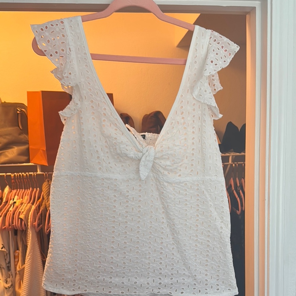 White Ruffled Tie Front Sleeveless Blouse